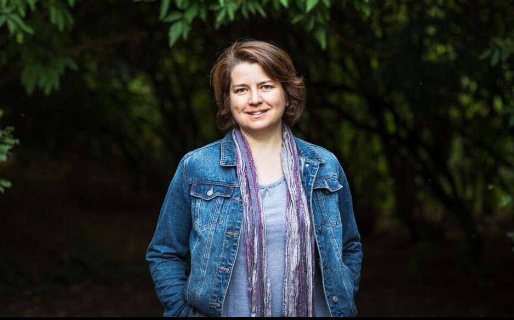 Alex Morss in a woodland setting